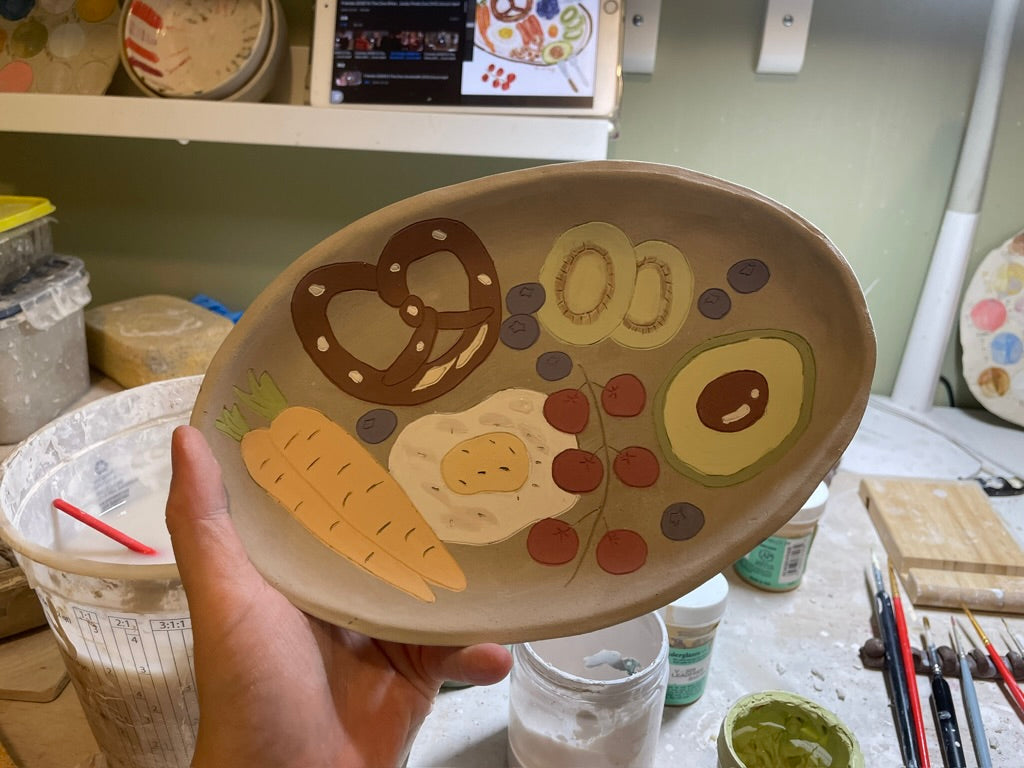 Little Nooks Ceramics | Handcrafted Ceramic Plate with Pretzel and breakfast elements 🍳🥨🥕🥑